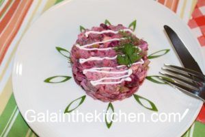 Photo Garnish with sour cream Russian beet root salad.