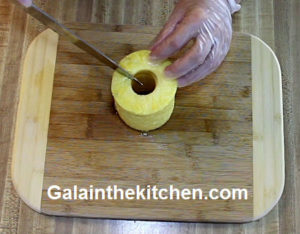 Photo How to slice pineapple with Norpro slicer step 6