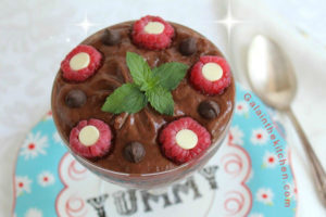 Photo Raspberries With Chocolate Garnish