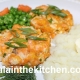 Salmon Patties Garnished with carrot Photo
